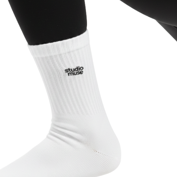 White sock with 'studio muse' logo on a white background