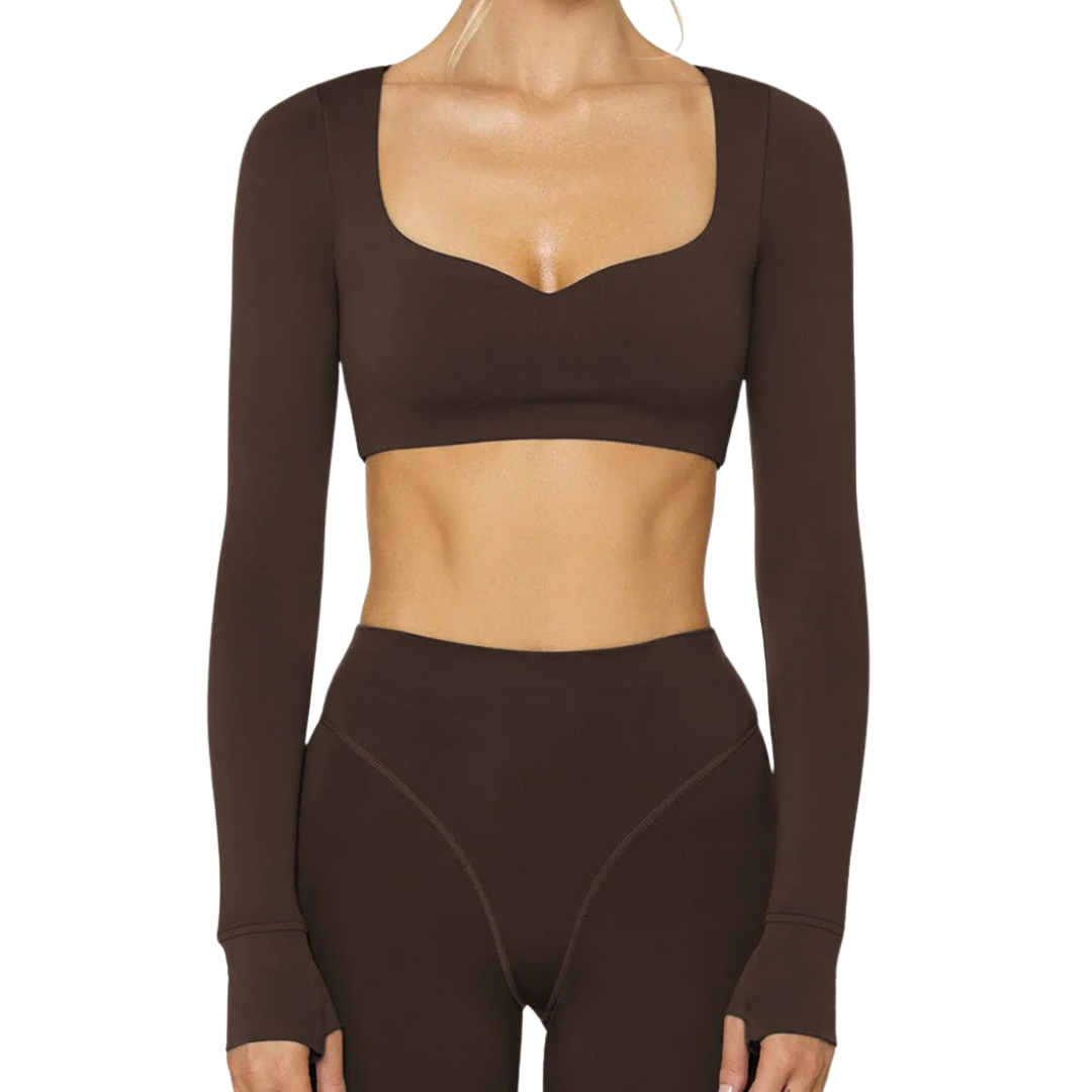 Brown long-sleeve crop top and high-waisted leggings set on a white background