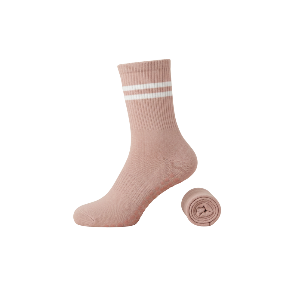 Pink sock with white stripes on a white background