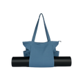 denim tote bag with a black yoga mat on a white background