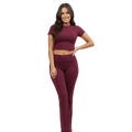 Woman wearing a maroon outfit on a white background